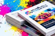 Stacks of printed programmes and brochures by City Print Service Sheffield